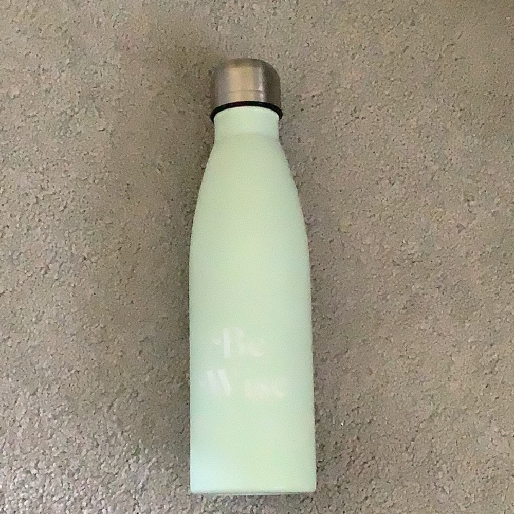 Teal water bottle has Be wise writing on it